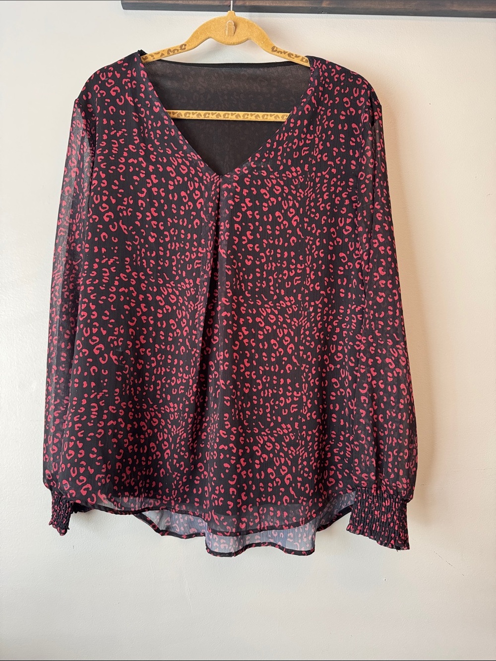 Women's Black Blouse with Pink Animal Print V-Neck
